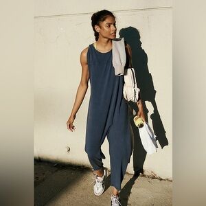 NWT Free People
Movement Hot Shot Crew Neck Sleeve Twisted Back Wide Leg Onesie